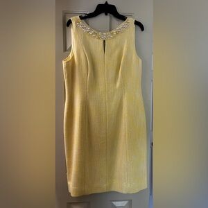 Yellow cocktail dress with embellished, bejeweled neckline.